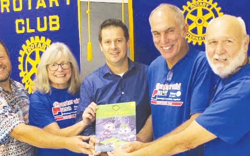 Disaster AID USA team pays visit to Rotary Club meeting