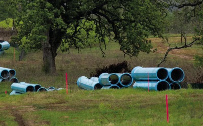 A water pipeline project by Recharge passes through Lee County into Williamson County, on March 28, 2025. Credit: Dylan Baddour / Inside Climate News