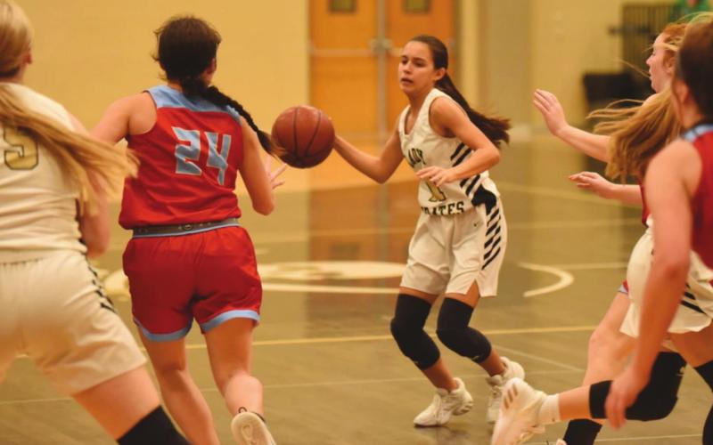 bigail Rodriguez prepares to pass in Friday’s game versus Lumberton.