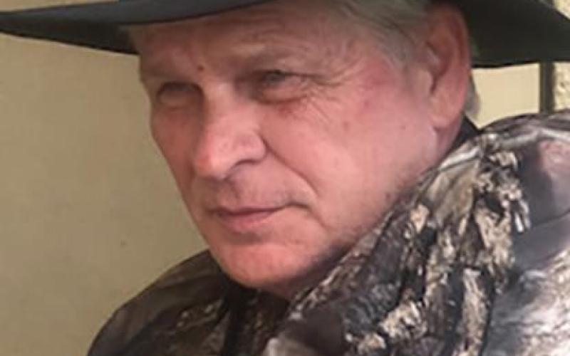 John “Dennis” Theall