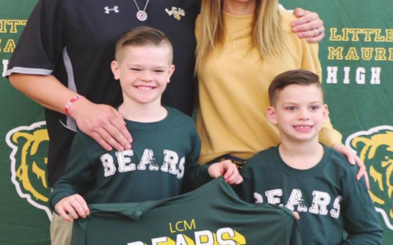 Peavey’s wife, Amy, with Will (8) and Greyson (6).