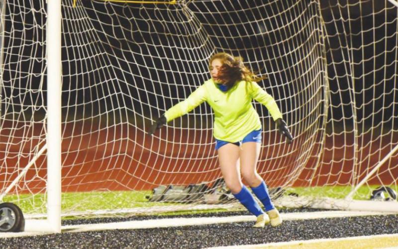 Lady Pirate Jaden Lee watches as a shot to the corner slips by the Kelly goal keeper for a Vidor score