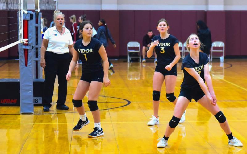 Freshman Lady Pirates Korbyn Whitworth #1, Allie Williams #3, and Michaela Droptini #7 in action against Silsbee Saturday in Gold Bracket play. Photos by Randall Luker