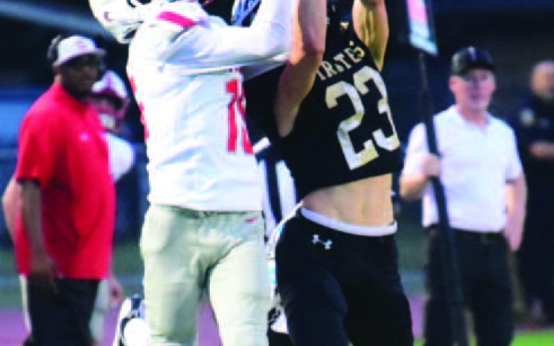 Dane Villadsen breaks up a Wildcat