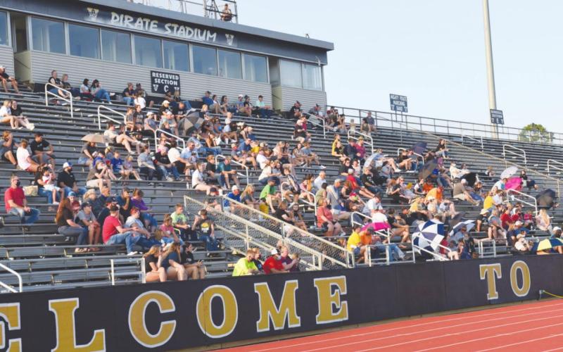 Pirate fans spread out and braved the heat to watch an intra-squad scrimmage Friday at Pirate Stadium