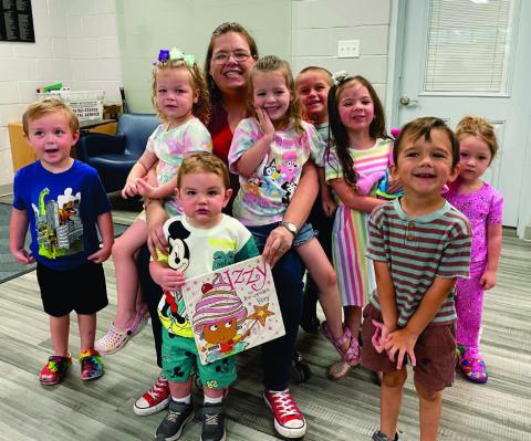The Vidor Public Library held the last Itty Bitty Storytime for 2024-2025. Library clerk Sarah Screws read “Izzy the Ice Cream Fairy “by Tim Bugbird. “Izzy and her friends run a magical ice-cream stall on the beach, until one day they discover that their ice-cream well has run dry. The friends travel to a new land in search of more delicious ice cream.” The children colored wooden ice cream cut-outs for the craft and enjoyed making ice cream for their treat.