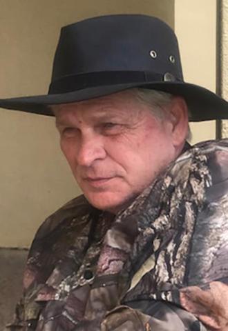 John “Dennis” Theall
