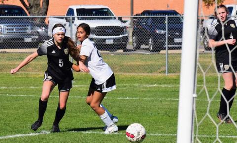 Laney King take a shot in the junior varsity game versus Huffman Friday at the Cajun Classic Tournament. Photo by Randall Luker