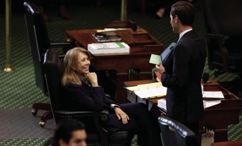 Senator Joan Huffman, R-Houston, speaks with Senator Mayes Middleton, R-Galveston, during a Texas Senate meeting on Budget Day, March 25, 2025. Credit: Lorianne Willett/The Texas Tribune