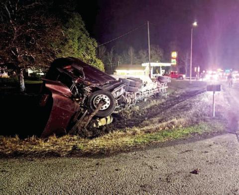 Overturned 18 wheeler shuts down FM 105 temporarily
