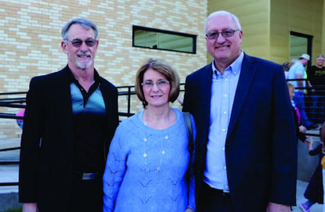 Tim Harland, Theresa Herring-Granger (widow of Rocky Herring), and Rollie Burr return to participate in the first flag ceremony of the new Oak Forest Elementary. VISD Courtesy Photo