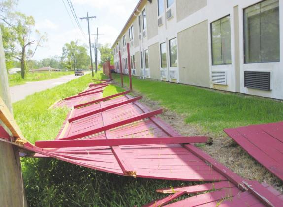 Hurricane Laura’s winds, estimated to be between 75 to 85 miles-per-hour blew down this fence behind a Vidor hotel.