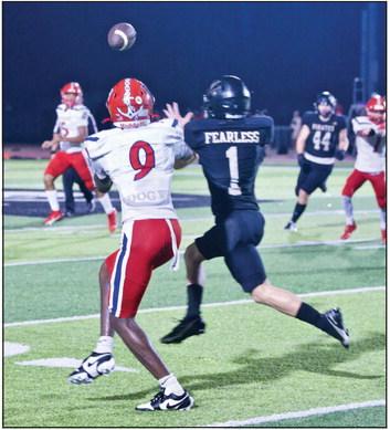 Westin Baker intercepted this ball on the run and sprinted 70 yards for a touchdown against the Exporters Friday in Vidor. Photo by Randall Luker
