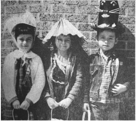 TOP WINNERS---in the Easter Parade held at the Combs Elementary School by the first grade students. The hat designed by KAY SIKES, left, was voted the prettiest; AVA LEE MULLETT, center, was awarded the “most unusual” spot, and ROBERT CLAYTON, right, won the award for having the “funniest.”