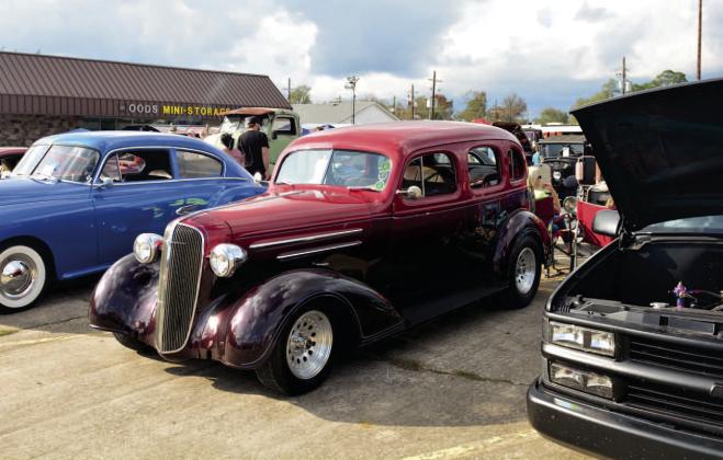 More than 60 classics and customs were on display Saturday at Woods Plaza before the Cruise later that evening. Photo by Randall Luker
