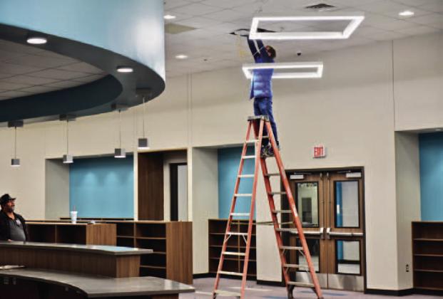 The Oak Forest Elementary library receives a few finishing touches last week.