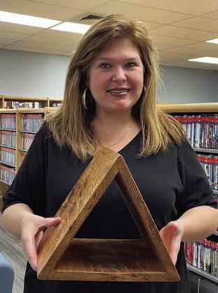 The winner of the Vidor Public Library drawing for the oak book stand is Tamra Barney. The book stand was donated to the library by Chris Screws of 1 of 99 Woodcrafts. The proceeds will help support the Summer Reading Program 2023. Courtesy Photo