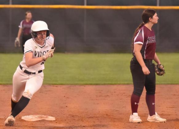 Natalie Morrison lights the afterburners as she sprints for home plate and a score in Tuesday’s game versus Silsbee. Photo by Randall Luker