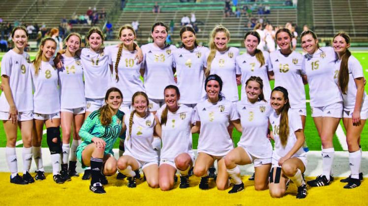 The varsity Lady Pirate soccer team has clinched a spot in the state playoffs for the 14th consecutive year under the leadership of Coach Ralph Fields. The lady Pirates defeated the LCM Lady Bears 4-3 Friday to secure their playoff spot. Photo by Randall Luker