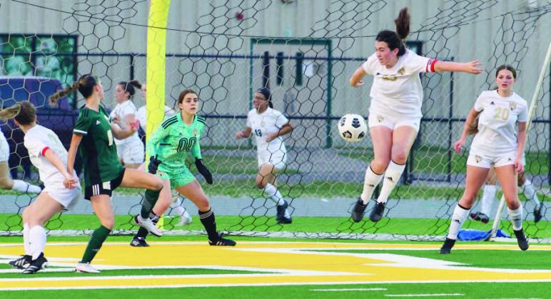 Lady Pirate defenders blocked this shot by th eLady Bears early in the game Vidor won 4-3. Photo by Randall Luker