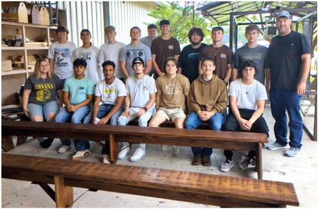 Mr. Hartman's Building Trades Classes at Vidor High School have constructed three 12 foot benches for @Vidor Middle School VMS students to sit on while they wait for their parent rides in the afternoons. The benches are braced and stained with the ever-popular 'Early American' color stain. Great job to the Building Trades students and Mr. Hartman on a beautiful wood project! VISD Courtesy Photo