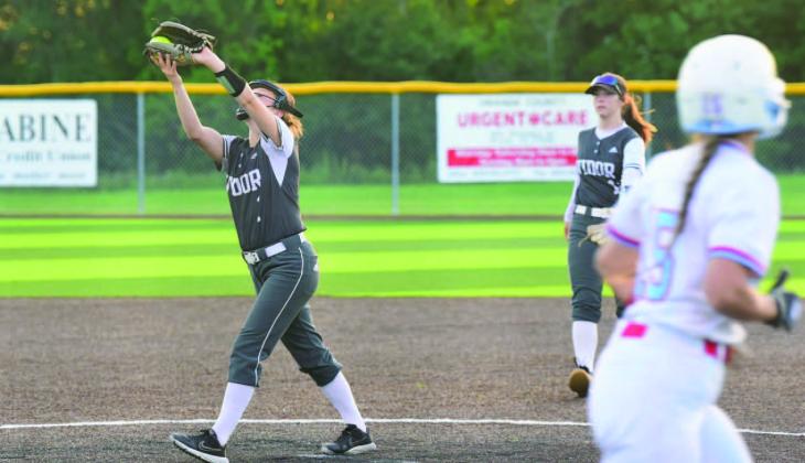 Lady Pirate pitcher Keira McCurley can field as well as pitch as she handles this pop up for an out in Monday’s seeding game versus Lumberton. Vidor won 9-4 to secure third place in district. Eryn Barraza is backing her up from her shortstop position.