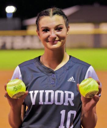 Andreya Garrett holds her two home run balls hit in Friday’s final regular season game. The Lady Pirates now move on to bi-district playoff action. Photo by Randall Luker