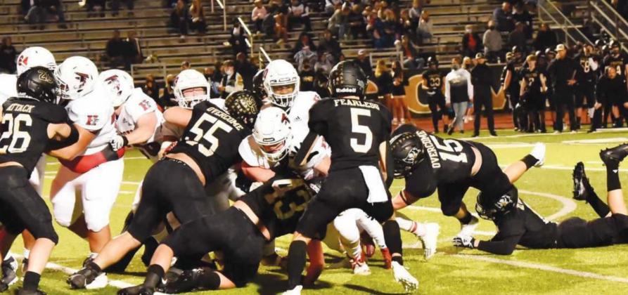 The Pirate defense came through time and again Friday with plays like this 4th and 1 stop on the six-yard line. Identifiable Pirates include #26 Layne Wilhelm. #55 Jordan Smith, #43 Colby Smith, #5 Dylan Dial and #15 Tristen McGowan.