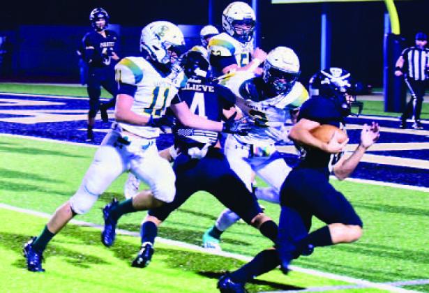 Daigan Venable runs to the end zone for a TD with blocking by Ricky Gall. Photo by Randall Luker