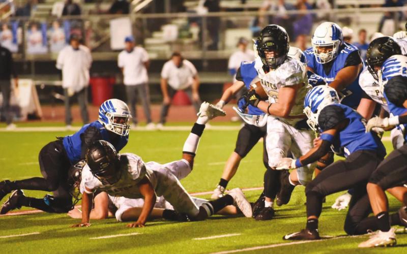 Pirate RB Trenton Conn looks for room to run in a crowd.