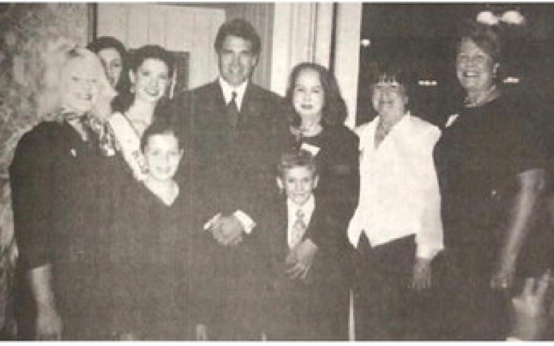 Pictured with Texas Governor Rick Perry at roast of retiring State Representative Ron Lewis are, from left, Chrystal Reeves, Lena Rambo, Miss Texas USA Nicole O'Brian, Brandi Motte, CASA Executive Director Jane Stevenson, Corby Stevenson, Ellen Hay and Sharon McMullen.
