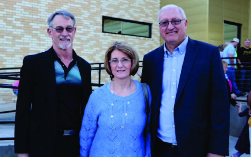 Tim Harland, Theresa Herring-Granger (widow of Rocky Herring), and Rollie Burr return to participate in the first flag ceremony of the new Oak Forest Elementary. VISD Courtesy Photo