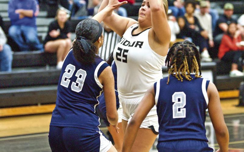 Lady Mustangs as. Madison Perkins