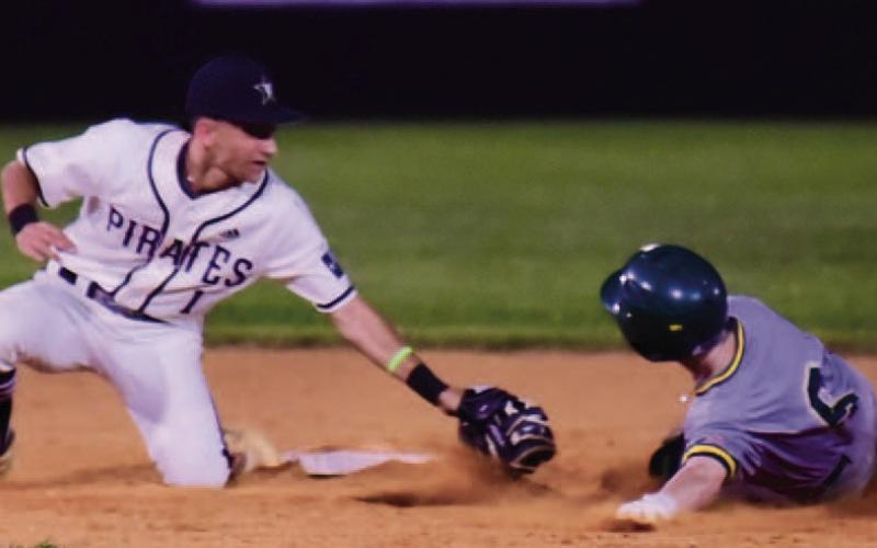 Austin Cadroy makes the play to tag an LCM runner trying to slide in to second base Tuesday in Vidor.