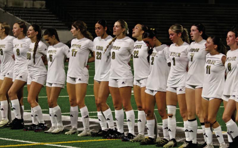 Lady Pirates continue the tradition of joining fans in singing the school song “Hail Alma Mater” following the match.