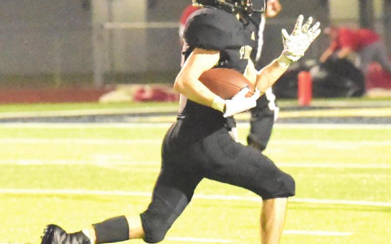 Nathan Bullard won’t be caught on his way to a 64-yard touchdown pass reception from Quinten Root.