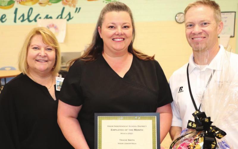 Tracie Smith, pictured with Director of Child Nutrition, Mary Ellen Vivrett and Dr. Jay Killgo, Superintendent of Schools