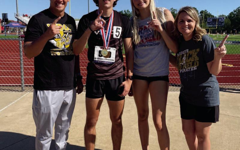 Two Vidor High School athletes will be competing in the 4A State Track Meet in Austin May 2-4 after qualifying at the Regional meet held in Bullard Friday and Monday. Raegan Stephenson will be defending her 4A State Champion title while Blake Richards will be competing in the 300 meter hurdles after his first place finish at the Regional Meet. Pictured are Coach Austin Powell, Richards, Stephenson and Coach Tracy Maines.