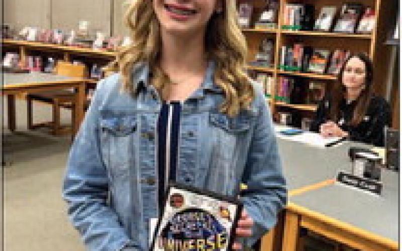 Taylor Rye represented Vidor Junior High School in honoring School Board President Mike Helms.