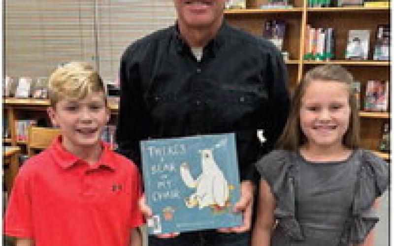 Aiden Barrow and Landrie Gunstream represented Oak Forest Elementary in honoring School Board Member David Camp.