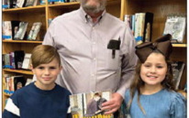 Vidor Elementary students Parker Santana and Avery Bruno honored School Board Member Dr. Billy Jordan. VISD Courtesy Photos