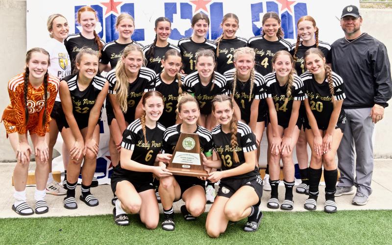 2024 Lady Pirates with Coaches Ralph Fields and Ciera Tinkle and their Regional Finals trophy