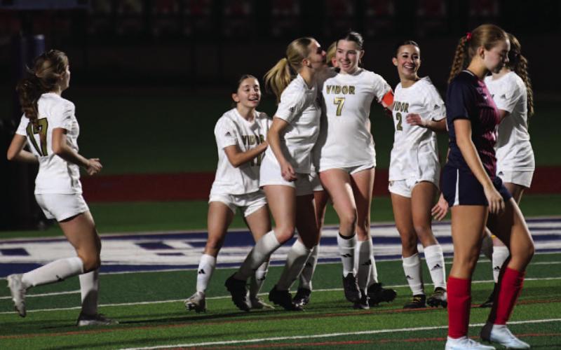 Lady Pirates react after the game-winning penalty kick at HF.