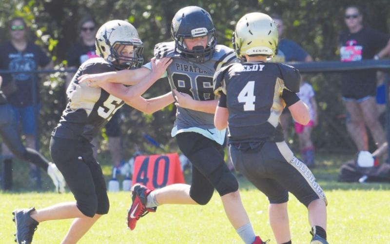 VPIFA Senior #86 Brody Stankovich pressures the Nederland QB in Saturday’s game.