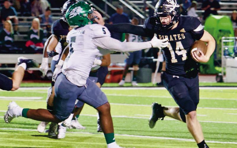 Pirates celebrate Homecoming with 30-21 win over Livingston Lions