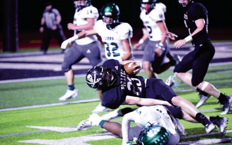 Pirates celebrate Homecoming with 30-21 win over Livingston Lions
