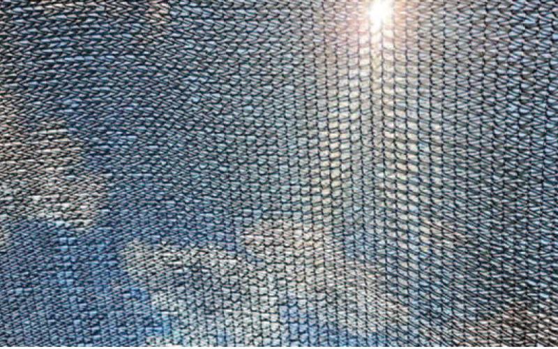 Black shade cloth is often the preferred fabric color because it blocks more UV rays from reaching the plants underneath. A layer of heat does form immediately beneath the cloth, but if the cloth doesn’t touch plants directly (allowing air to circulate), heat will rise through the fabric (image: epicgardening.com).