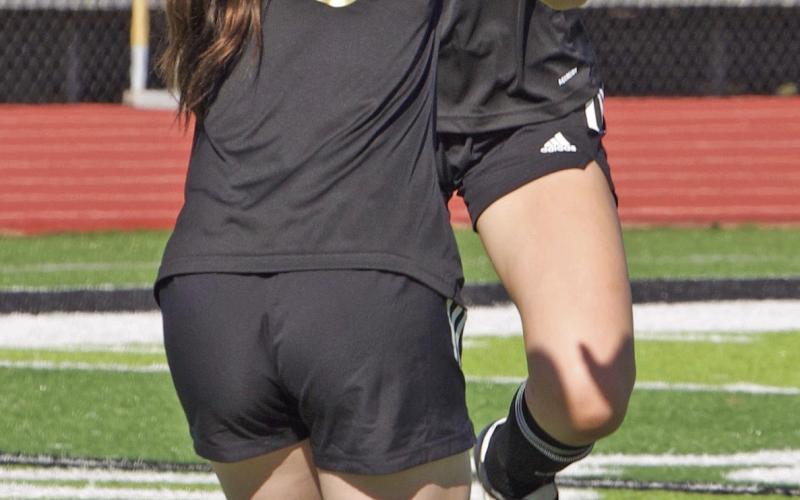 Celebration Miley Rice, back to camera, helps Jillian Allen celebrate after Allen scored a goal Tuesday.