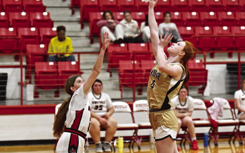 Ashlynn Martin takes a shot during Friday’s win over the Deweyville Lady Pirates.