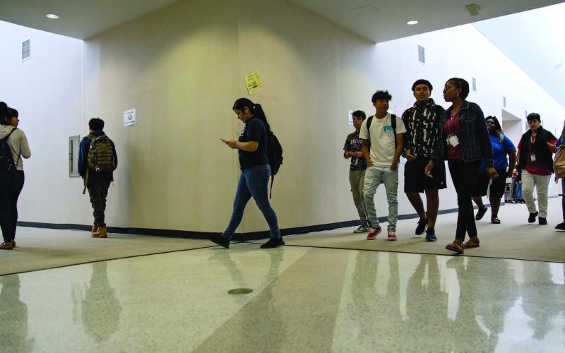 High school students walk to an after-school science tutorial that provides additional support for students taking the STAAR test at Elsik 9th Grade Center on April 19, 2018. Credit: Pu Ying Huang for The Texas Tribune